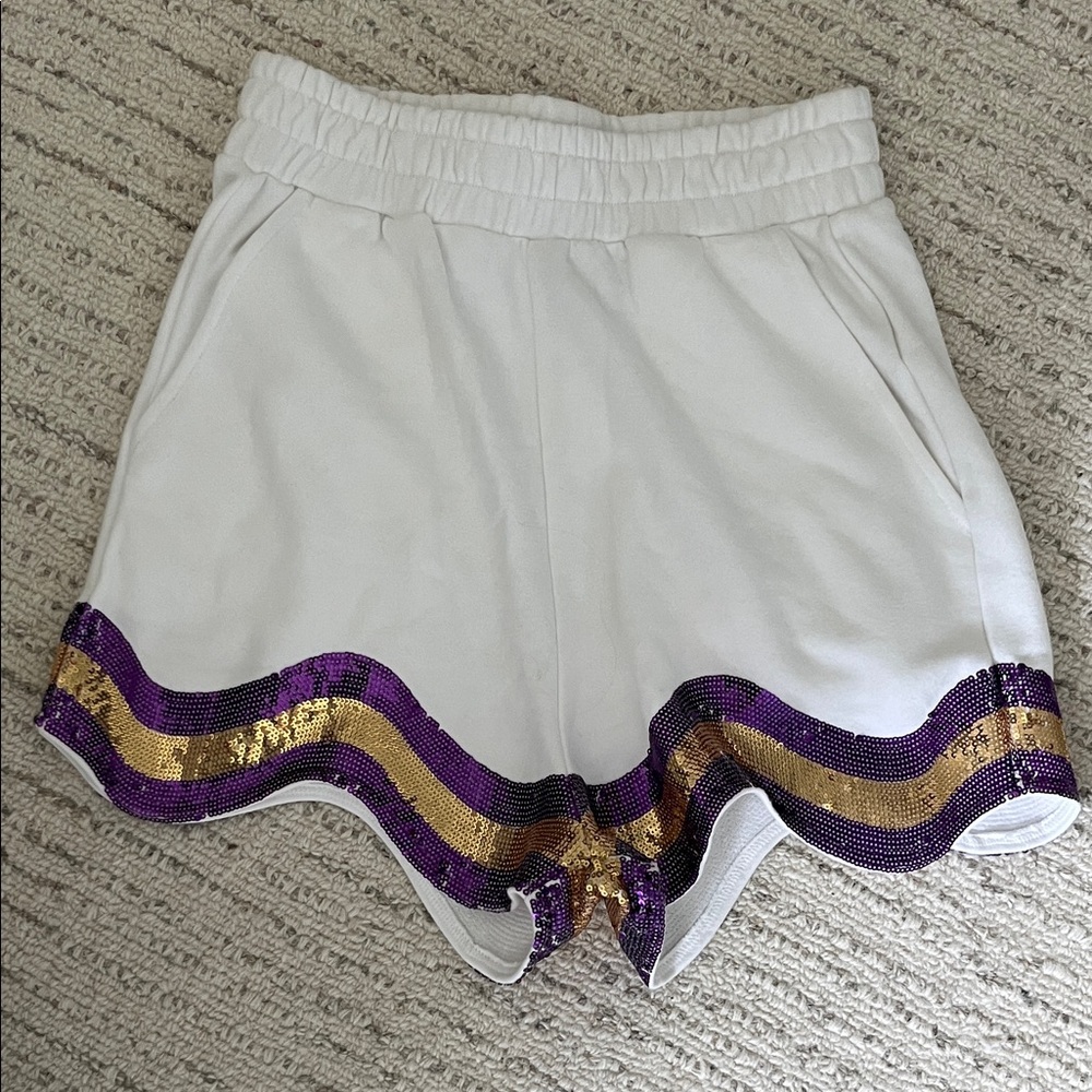 QUEEN OF SPARKLES White Shorts with Purple and Gold Sequin Trim